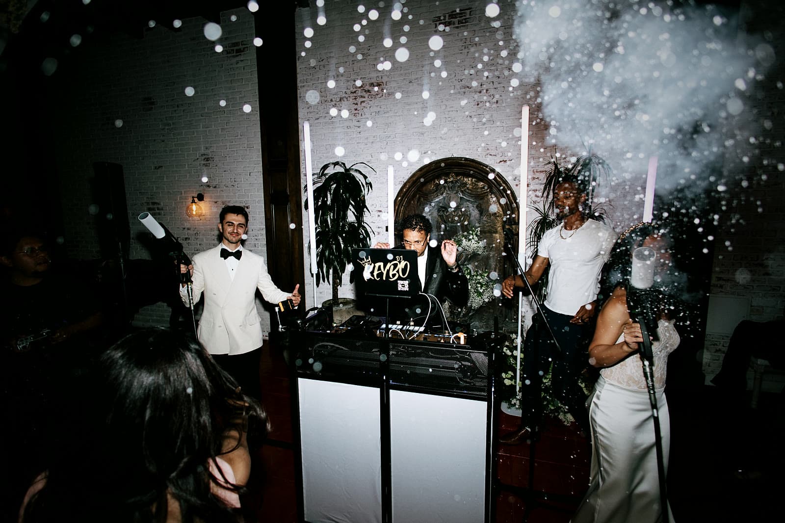 Confetti and cold sparks over the DJ booth