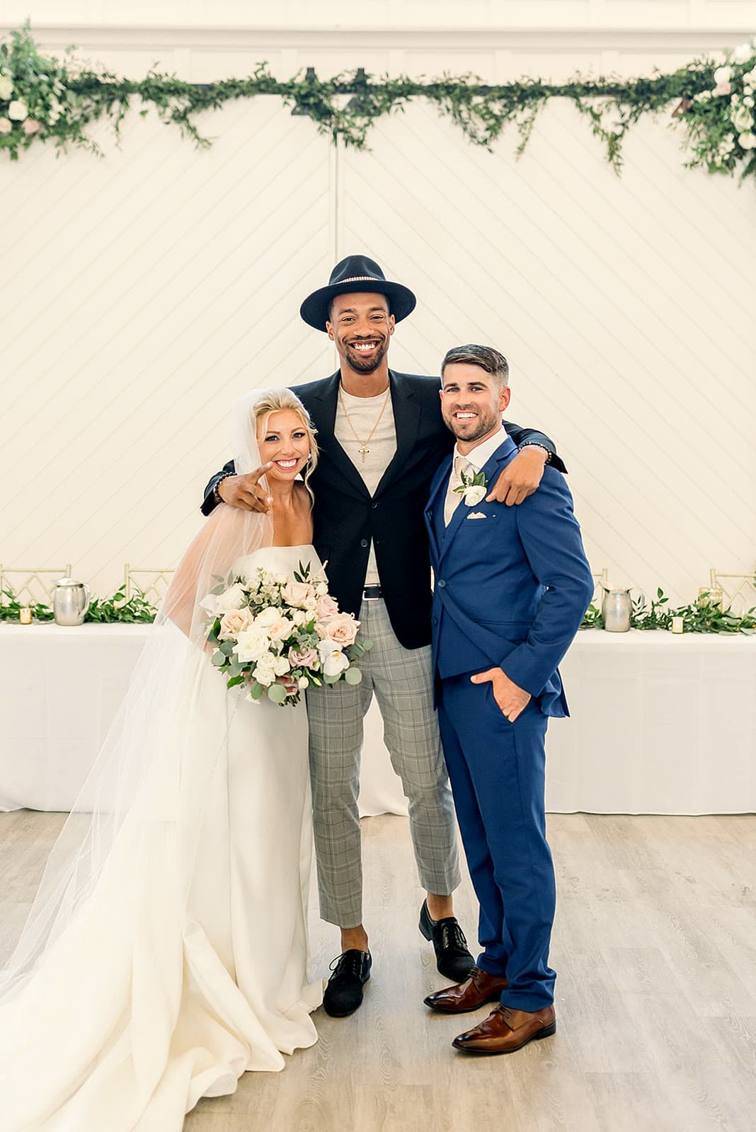 DJ Keybo with a bride and groom