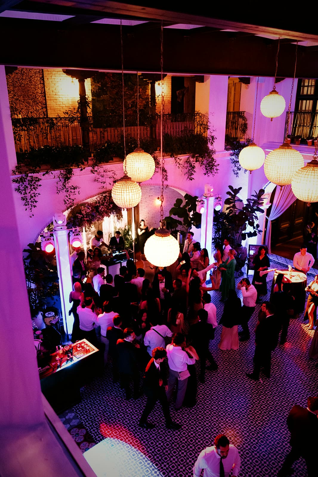 Looking down from the balcony on a full dance floor